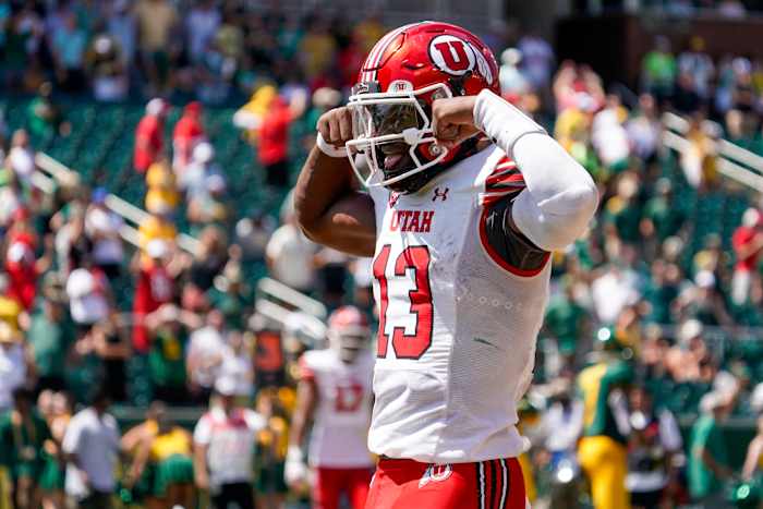 Sep 9, 2023; Waco, Texas, USA; Utah Utes quarterback Nate Johnson (13) carries the ball for a 11-yard touchdown against the Baylor Bears during the second half at McLane Stadium. Mandatory Credit: Raymond Carlin III-USA TODAY Sports